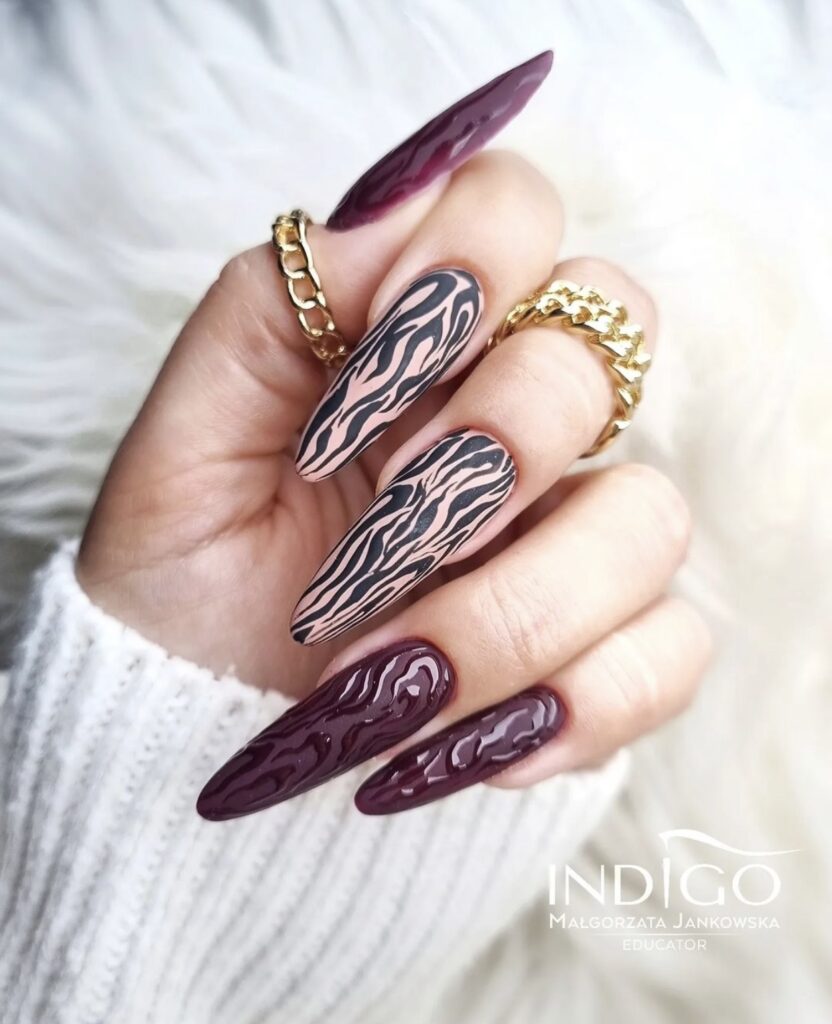 burgundy zebra nails