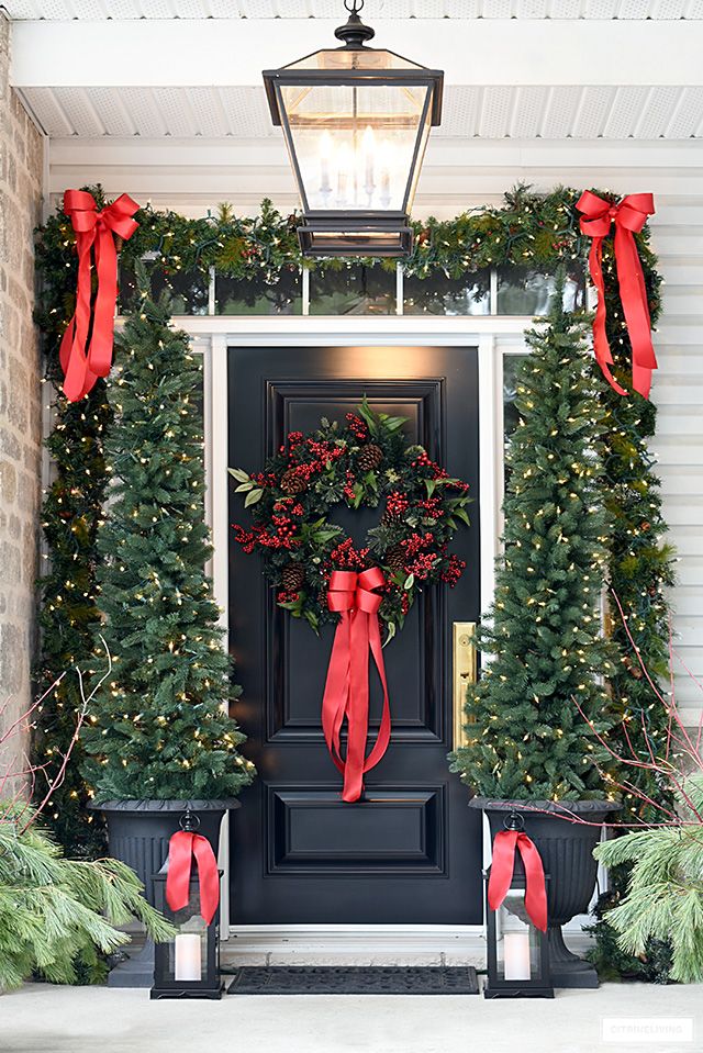 outdoor christmas decor on white house