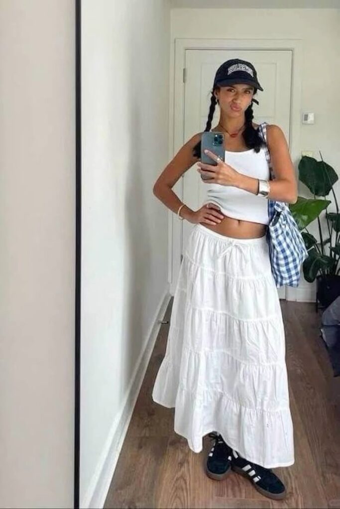 relaxed boho maxi skirt with a white top and adidas sambas