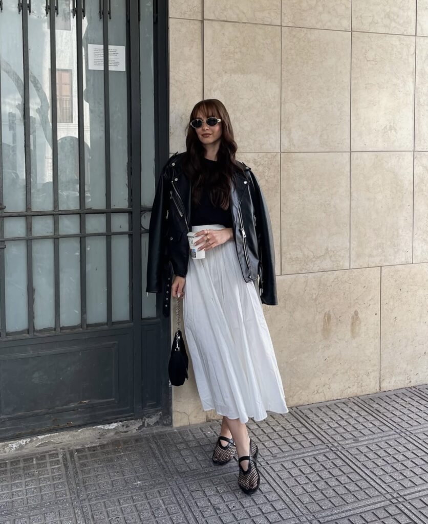 chic white maxi skirt with a tucked in tank and a leather jacket for a summer evening