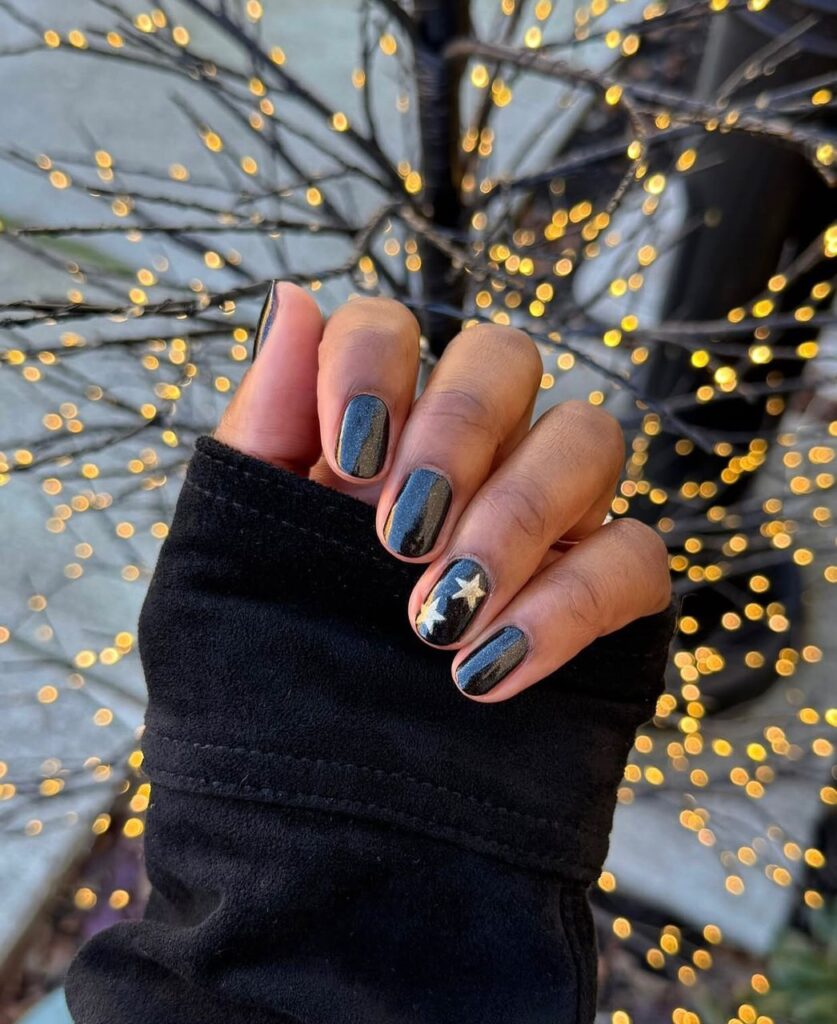 black and gold new years nails